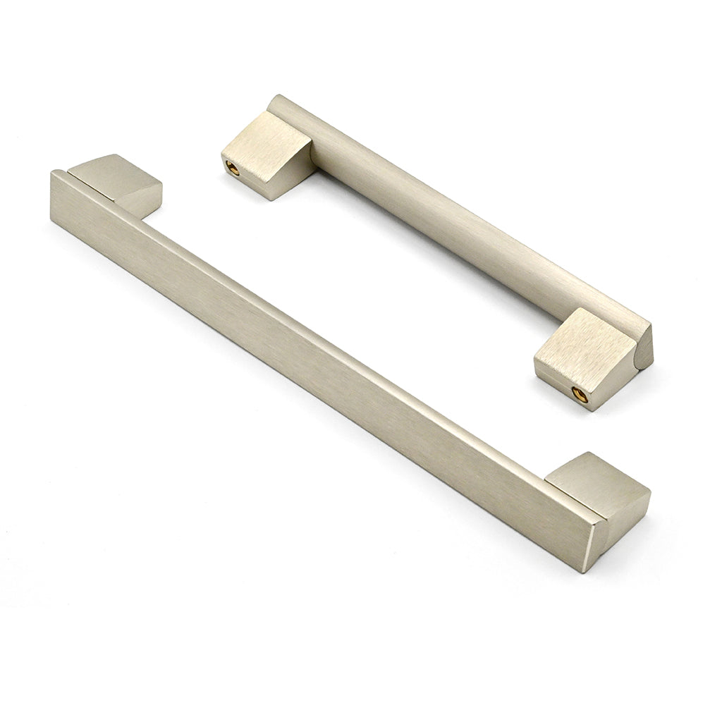 Two metallic door handles