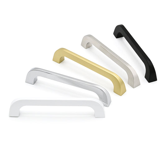 Set of four metallic cabinet handles in gold, silver, white, and black on a white background.