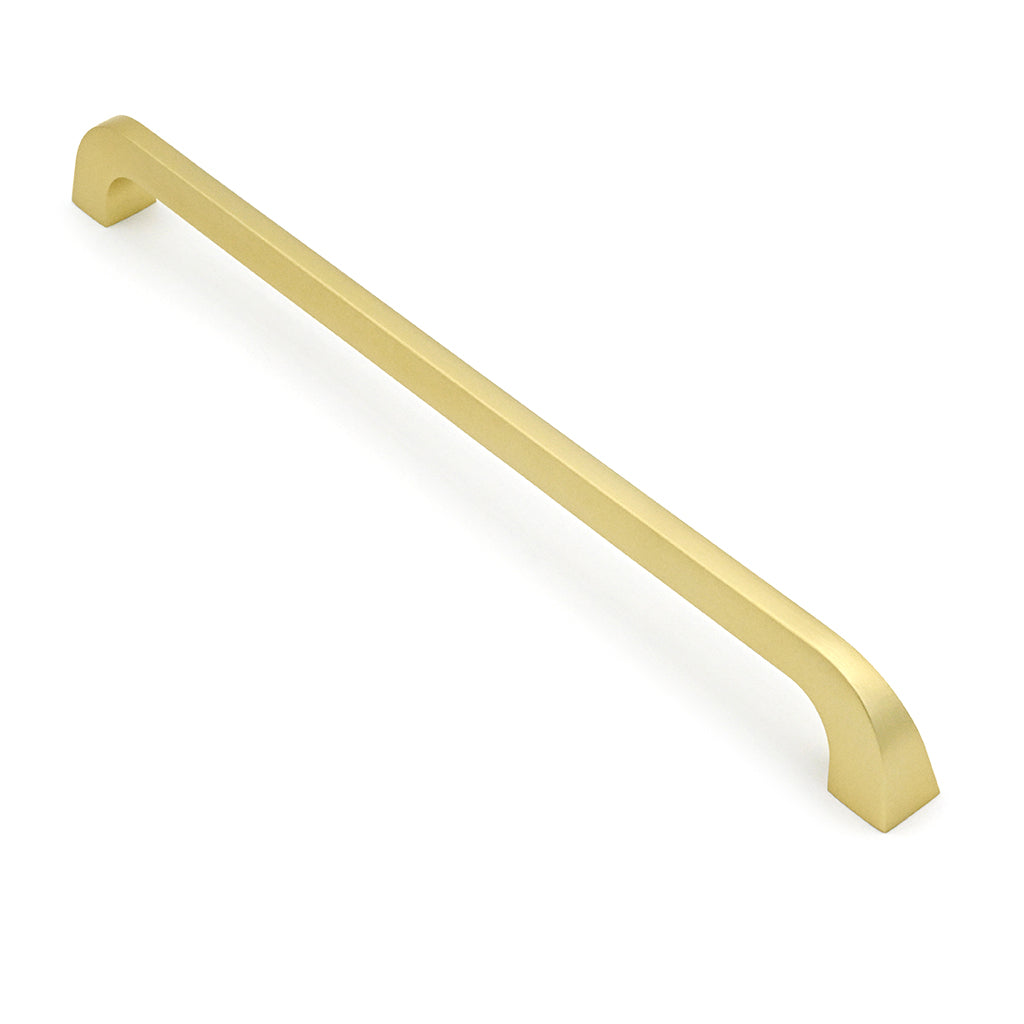 Gold cabinet handle on a white background