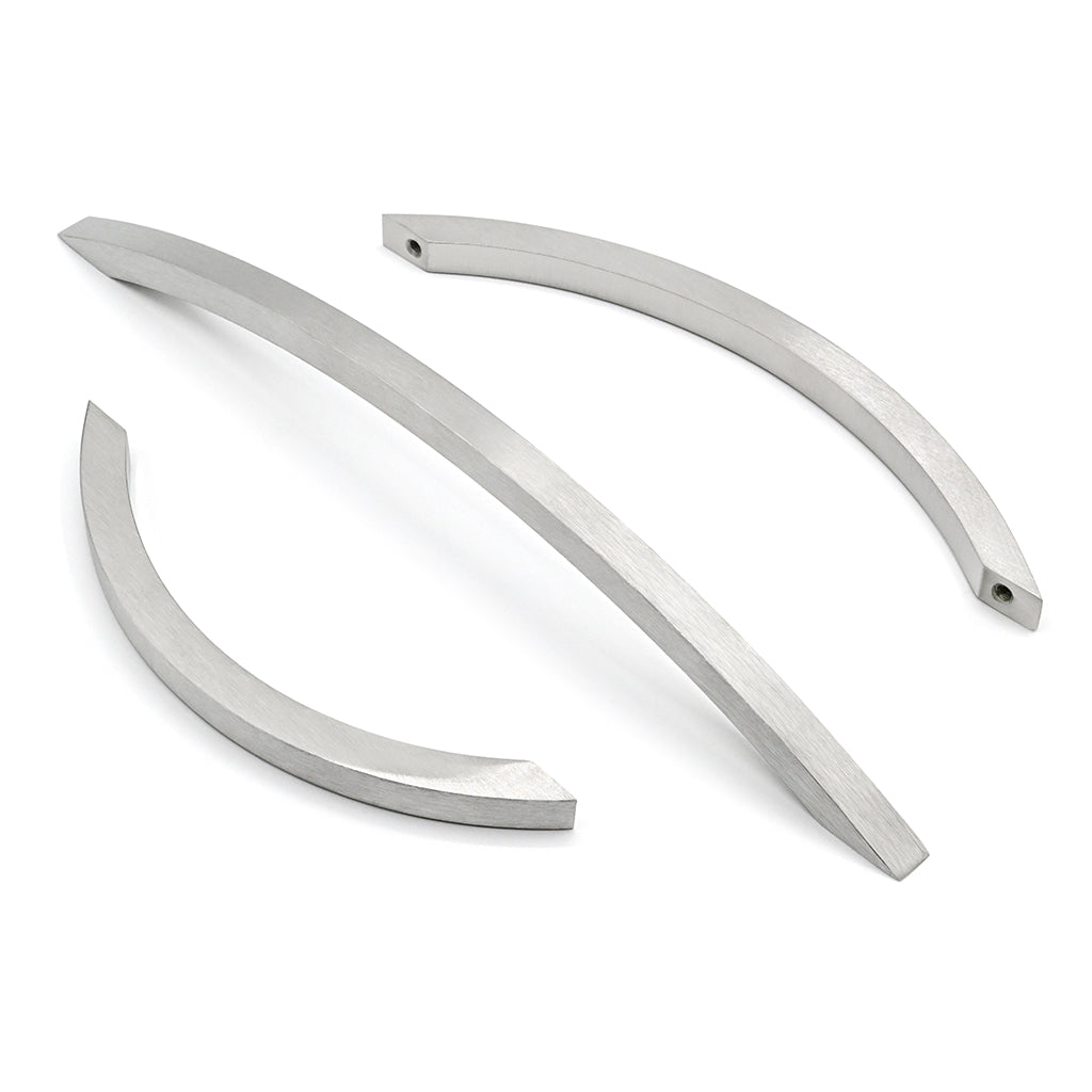 Three curved metal strips on a white background