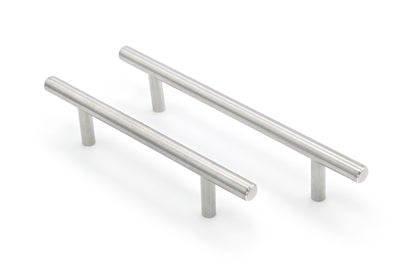 Two metallic cabinet handles